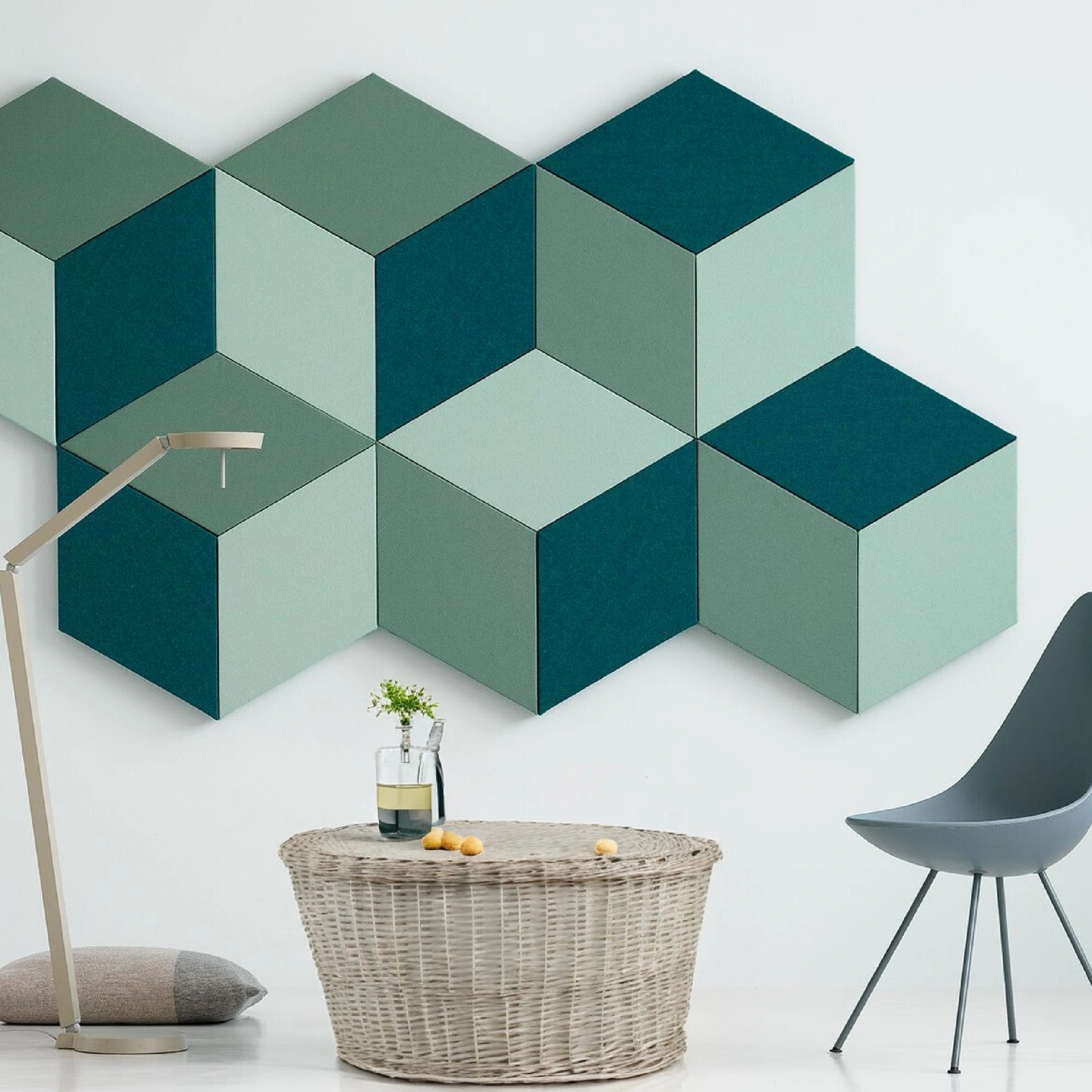 Cubic PET acoustic panels in green shades on a modern wall